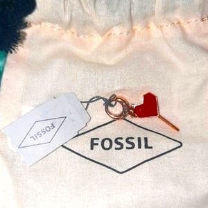 Fossil Heart Lolipop Charm